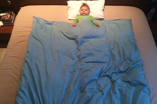 Baby on Groom's Bed