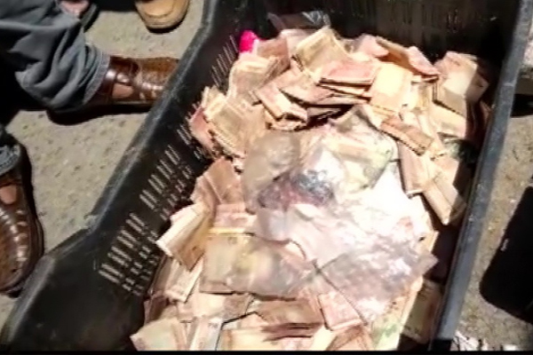 Cash found in beggar woman's home