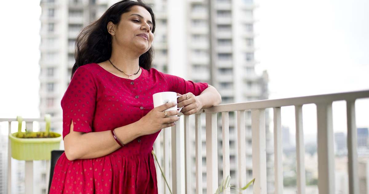 Woman with cup of coffee