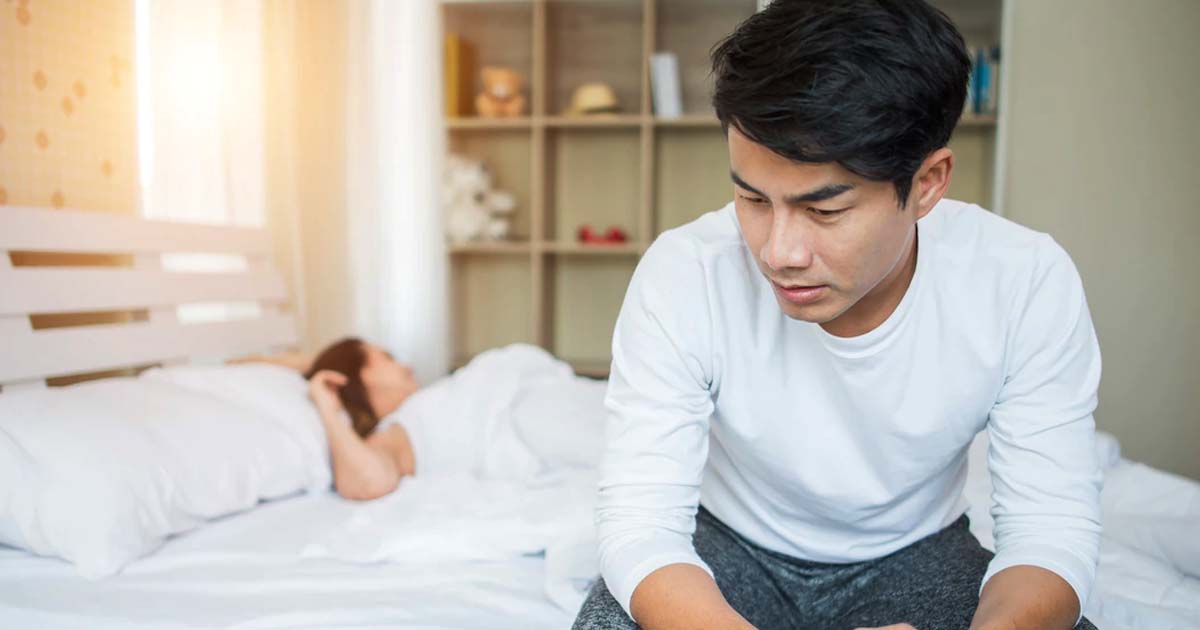 Boys sitting on bed