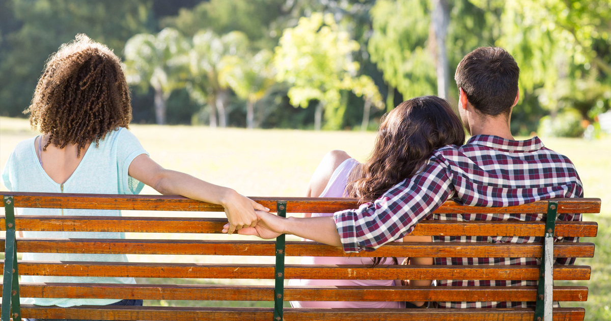 The girl introduced her friend to her boyfriend,