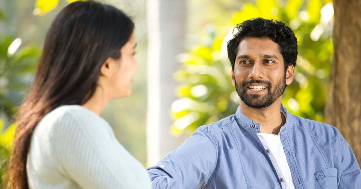 Couple discussing at park