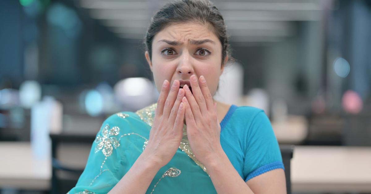 Indian Woman showing Quiet Sign