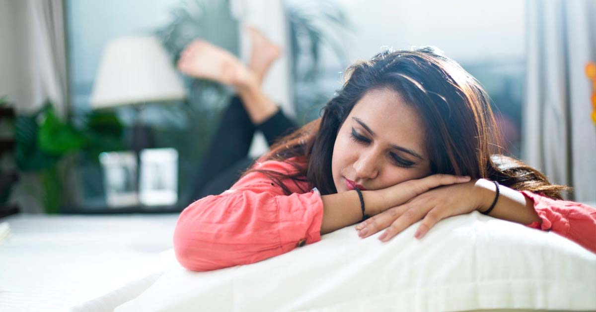 Woman Happy in Bed