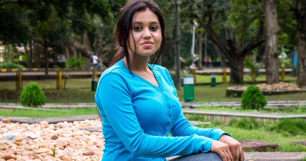 Woman Sitting on Park