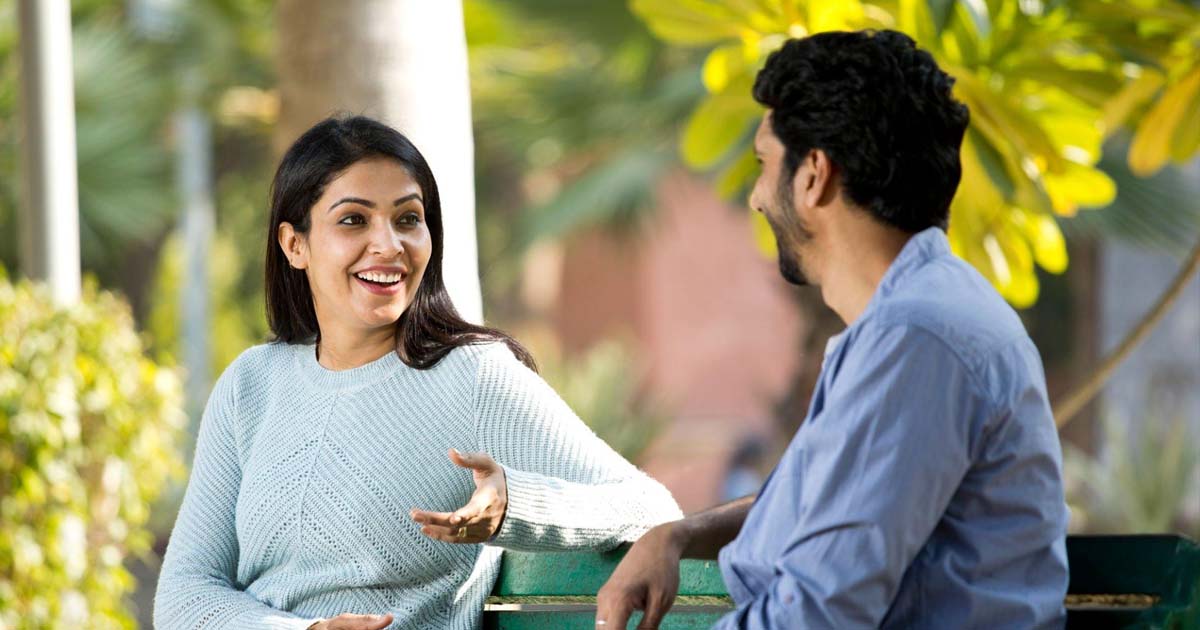 Couple discussing at park