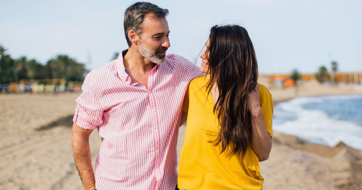 Couple walking on the beach