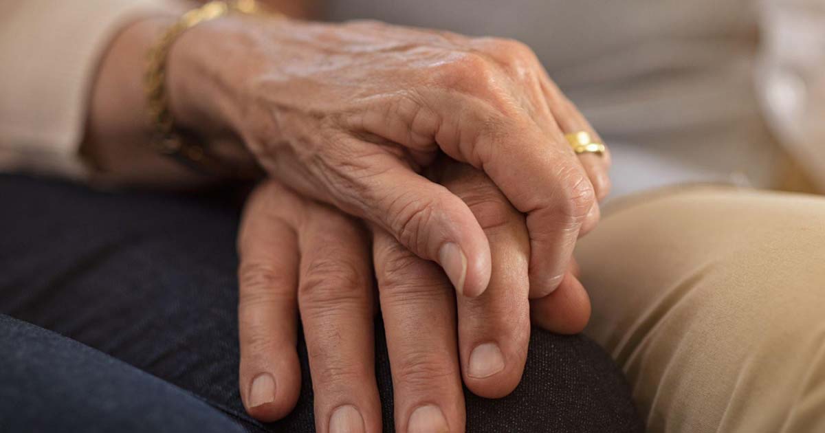 Senior couple holding