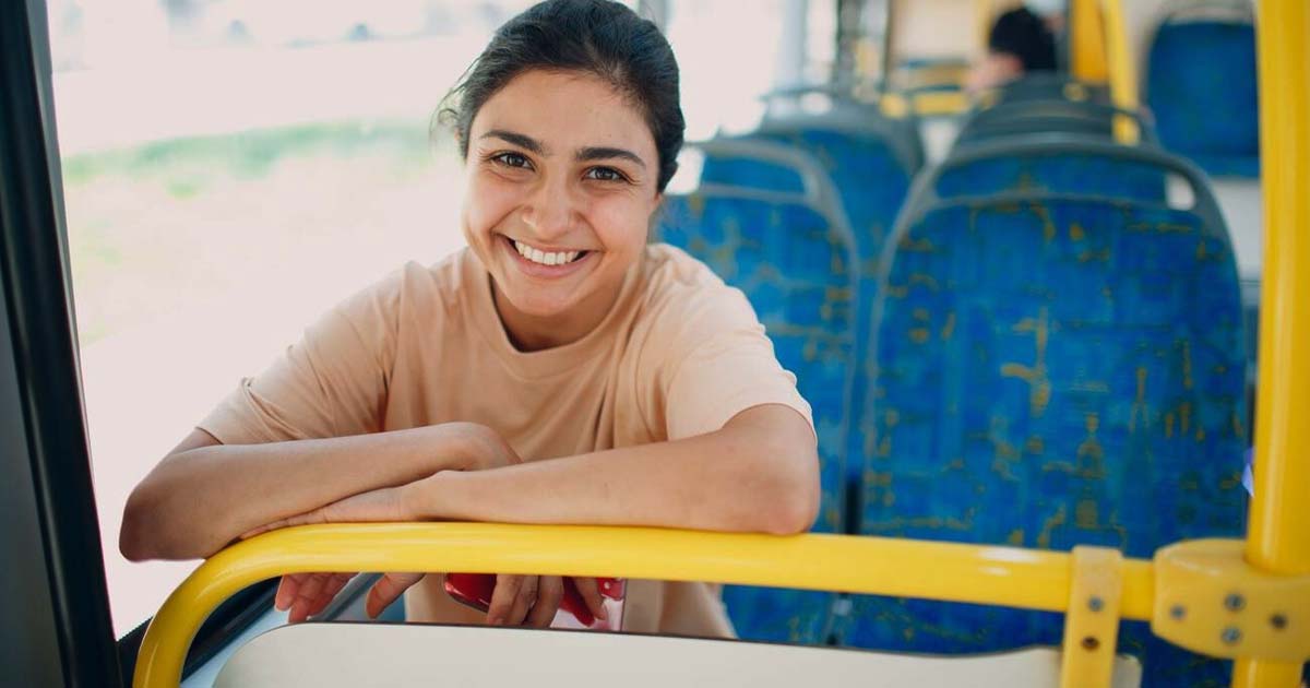 Woman ride in public transport bus