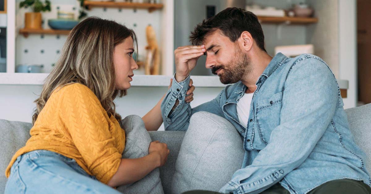 Worried couple talking together