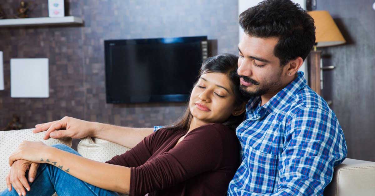 Young Couple Sitting sofa